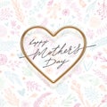 Mothers day greeting card. Realistic golden heart with calligraphy on a floral background.